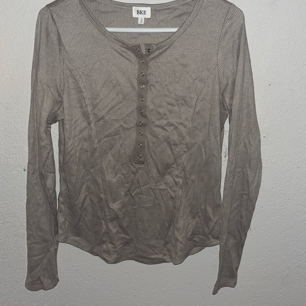 Half buttoned shirt